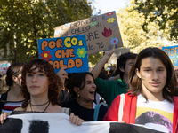 Protesters participate in the climate protest ''Fridays For Future'' in Turin, Italy, on October 11, 2024. The Fridays for the Future moveme...