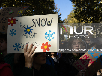 Protesters participate in the climate protest ''Fridays For Future'' in Turin, Italy, on October 11, 2024. The Fridays for the Future moveme...