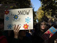 Protesters participate in the climate protest ''Fridays For Future'' in Turin, Italy, on October 11, 2024. The Fridays for the Future moveme...