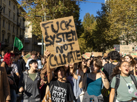 Protesters participate in the climate protest ''Fridays For Future'' in Turin, Italy, on October 11, 2024. The Fridays for the Future moveme...