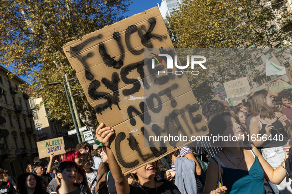 Protesters participate in the climate protest ''Fridays For Future'' in Turin, Italy, on October 11, 2024. The Fridays for the Future moveme...