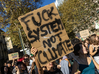 Protesters participate in the climate protest ''Fridays For Future'' in Turin, Italy, on October 11, 2024. The Fridays for the Future moveme...