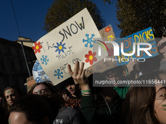 Protesters participate in the climate protest ''Fridays For Future'' in Turin, Italy, on October 11, 2024. The Fridays for the Future moveme...