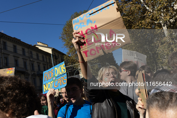 Protesters participate in the climate protest ''Fridays For Future'' in Turin, Italy, on October 11, 2024. The Fridays for the Future moveme...