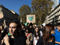 Protesters participate in the climate protest ''Fridays For Future'' in Turin, Italy, on October 11, 2024. The Fridays for the Future moveme...