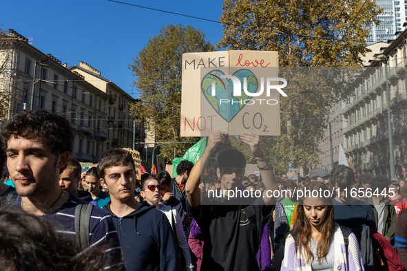 Protesters participate in the climate protest ''Fridays For Future'' in Turin, Italy, on October 11, 2024. The Fridays for the Future moveme...