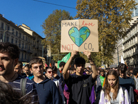 Protesters participate in the climate protest ''Fridays For Future'' in Turin, Italy, on October 11, 2024. The Fridays for the Future moveme...