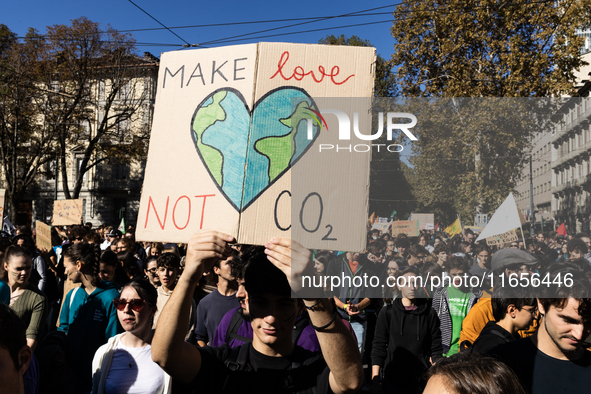 Protesters participate in the climate protest ''Fridays For Future'' in Turin, Italy, on October 11, 2024. The Fridays for the Future moveme...