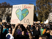 Protesters participate in the climate protest ''Fridays For Future'' in Turin, Italy, on October 11, 2024. The Fridays for the Future moveme...