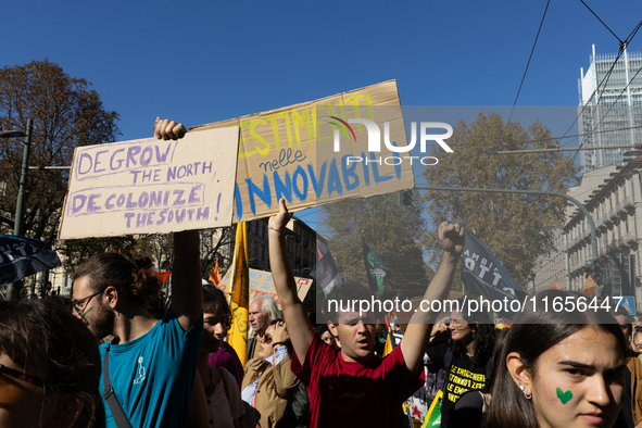 Protesters participate in the climate protest ''Fridays For Future'' in Turin, Italy, on October 11, 2024. The Fridays for the Future moveme...