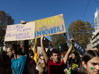 Protesters participate in the climate protest ''Fridays For Future'' in Turin, Italy, on October 11, 2024. The Fridays for the Future moveme...