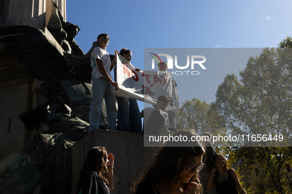 Protesters participate in the climate protest ''Fridays For Future'' in Turin, Italy, on October 11, 2024. The Fridays for the Future moveme...