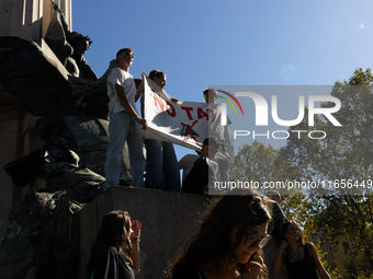 Protesters participate in the climate protest ''Fridays For Future'' in Turin, Italy, on October 11, 2024. The Fridays for the Future moveme...