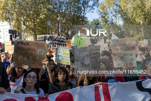 Protesters participate in the climate protest ''Fridays For Future'' in Turin, Italy, on October 11, 2024. The Fridays for the Future moveme...