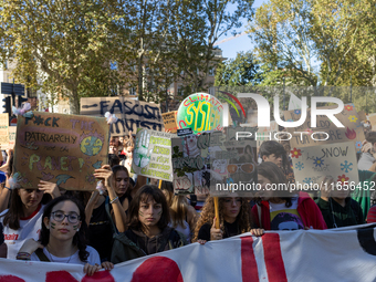 Protesters participate in the climate protest ''Fridays For Future'' in Turin, Italy, on October 11, 2024. The Fridays for the Future moveme...