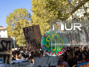 Protesters participate in the climate protest ''Fridays For Future'' in Turin, Italy, on October 11, 2024. The Fridays for the Future moveme...