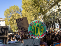 Protesters participate in the climate protest ''Fridays For Future'' in Turin, Italy, on October 11, 2024. The Fridays for the Future moveme...