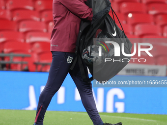 Lee Carsley, Interim Head Coach of England, participates in the pre-match warm-up during the UEFA Nations League Group 2 match between Engla...