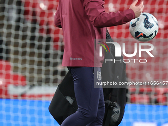 Lee Carsley, Interim Head Coach of England, participates in the pre-match warm-up during the UEFA Nations League Group 2 match between Engla...