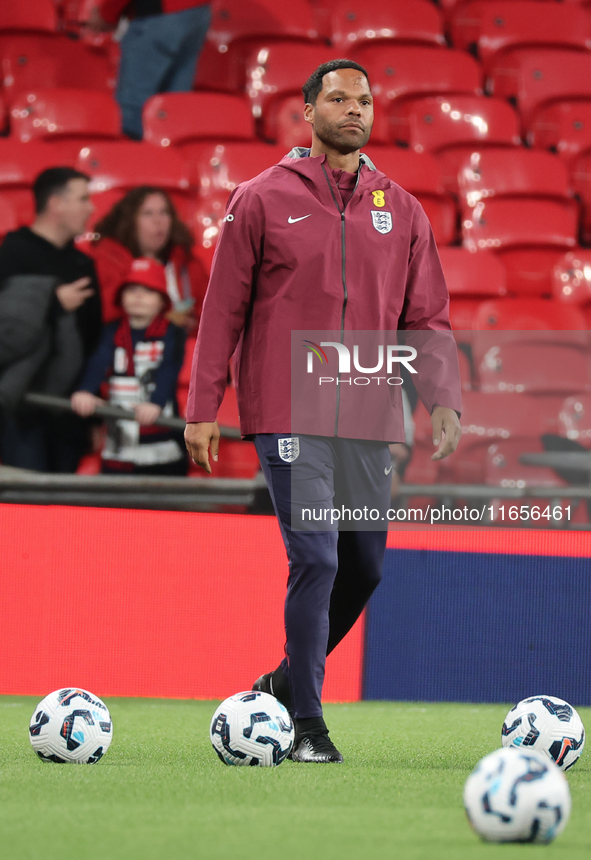 Joleon Lescott, interim coach of England, participates in the pre-match warm-up during the UEFA Nations League Group 2 match between England...