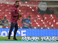 Assistant manager Ashley Cole (interim) of England participates in the pre-match warm-up during the UEFA Nations League Group 2 match betwee...