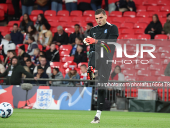 Odysseas Vlachodimos of Newcastle United and Greece participates in the pre-match warm-up during the UEFA Nations League Group 2 match betwe...