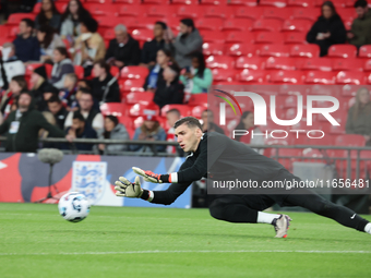 Odysseas Vlachodimos of Newcastle United and Greece participates in the pre-match warm-up during the UEFA Nations League Group 2 match betwe...