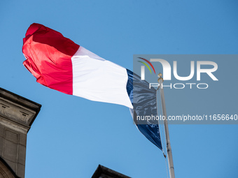 The French flag is above the Elysee Palace, home of President Emmanuel Macron, during the visit of Ukrainian President Volodymyr Zelensky in...