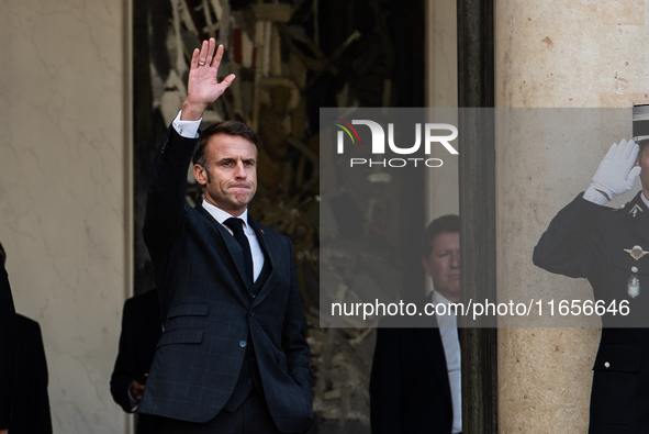 French President Emmanuel Macron and Ukrainian President Volodymyr Zelensky are at the Elysee Palace during the first bilateral summit of Ze...