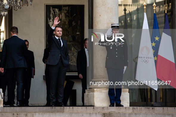 French President Emmanuel Macron and Ukrainian President Volodymyr Zelensky are at the Elysee Palace during the first bilateral summit of Ze...