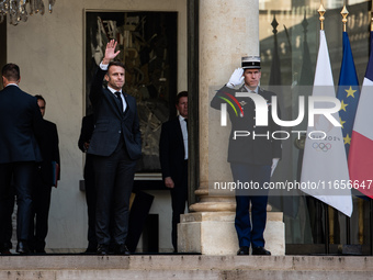 French President Emmanuel Macron and Ukrainian President Volodymyr Zelensky are at the Elysee Palace during the first bilateral summit of Ze...