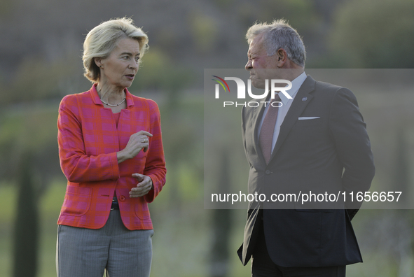 EU Commission President Ursula von der Leyen, left, and Jordan's King Abdullah II bin al-Hussein talk on the sidelines of the MED9 leaders'...