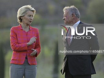 EU Commission President Ursula von der Leyen, left, and Jordan's King Abdullah II bin al-Hussein talk on the sidelines of the MED9 leaders'...