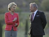 EU Commission President Ursula von der Leyen, left, and Jordan's King Abdullah II bin al-Hussein talk on the sidelines of the MED9 leaders'...