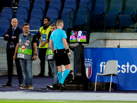 Referee Espen Eskas consults the pitch-side monitor after advice from the VAR during the UEFA Nations League 2024/25 League A Group A2 match...