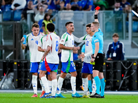 Referee Espen Eskas shows a red card to Lorenzo Pellegrini of Italy during the UEFA Nations League 2024/25 League A Group A2 match between I...