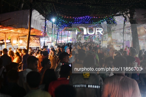 Hindu devotees visit a Puja Mandap during the Durga Puja festival in Dhaka, Bangladesh, on October 10, 2024. 