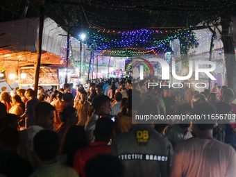 Hindu devotees visit a Puja Mandap during the Durga Puja festival in Dhaka, Bangladesh, on October 10, 2024. (