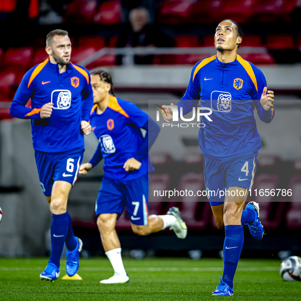 Netherlands defender Virgil van Dijk plays during the match between Hungary and the Netherlands at the Puskas Arena for the UEFA Nations Lea...