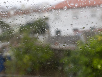 Raindrops are on a window during heavy rains in Lisbon, Portugal, on October 11, 2024. The national emergency and Civil Protection authority...