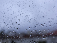 Raindrops are on a window during heavy rains in Lisbon, Portugal, on October 11, 2024. The national emergency and Civil Protection authority...