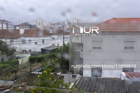 A general view of houses during heavy rains in Lisbon, Portugal, on October 11, 2024. The national emergency and Civil Protection authority...