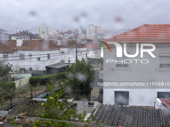 A general view of houses during heavy rains in Lisbon, Portugal, on October 11, 2024. The national emergency and Civil Protection authority...