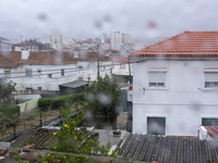 A general view of houses during heavy rains in Lisbon, Portugal, on October 11, 2024. The national emergency and Civil Protection authority...