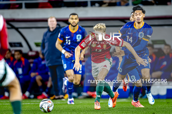 Hungary midfielder Andras Schafer and Netherlands midfielder Tijani Reijnders play during the match between Hungary and the Netherlands at t...