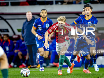 Hungary midfielder Andras Schafer and Netherlands midfielder Tijani Reijnders play during the match between Hungary and the Netherlands at t...