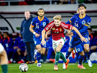 Hungary midfielder Andras Schafer and Netherlands midfielder Tijani Reijnders play during the match between Hungary and the Netherlands at t...