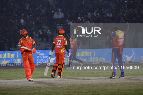 Kevon Cooper of Konark Suryas Odisha celebrates the dismissal of Gujarat Greats skipper Shikhar Dhawan during the Legends League Cricket T20...