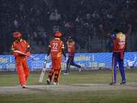 Kevon Cooper of Konark Suryas Odisha celebrates the dismissal of Gujarat Greats skipper Shikhar Dhawan during the Legends League Cricket T20...