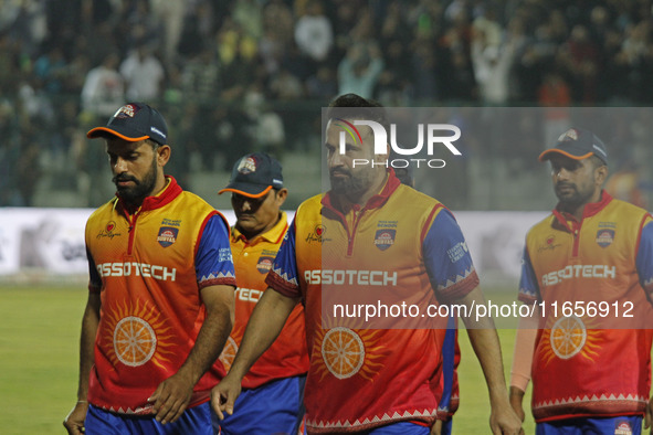 Skipper Irfan Pathan (C) of Konark Suryas Odisha is pictured with teammates during the Legends League Cricket T20 match between Gujarat Grea...